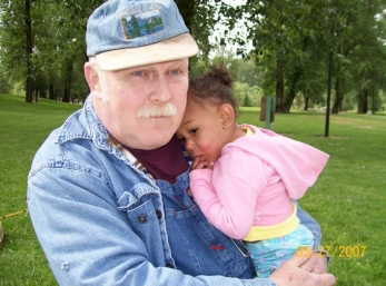 Safe in Grandpa's arms